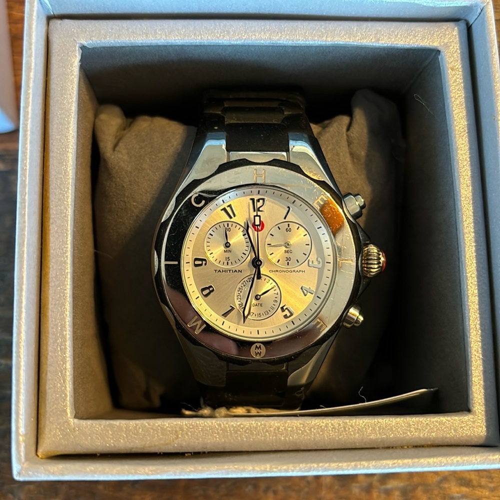 Woman’s  with tags Michele watch Black